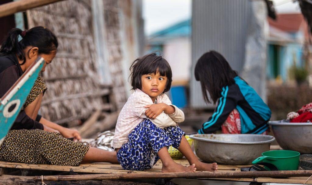 A young girl in the floating village community of Tonle Sap, Cambodia