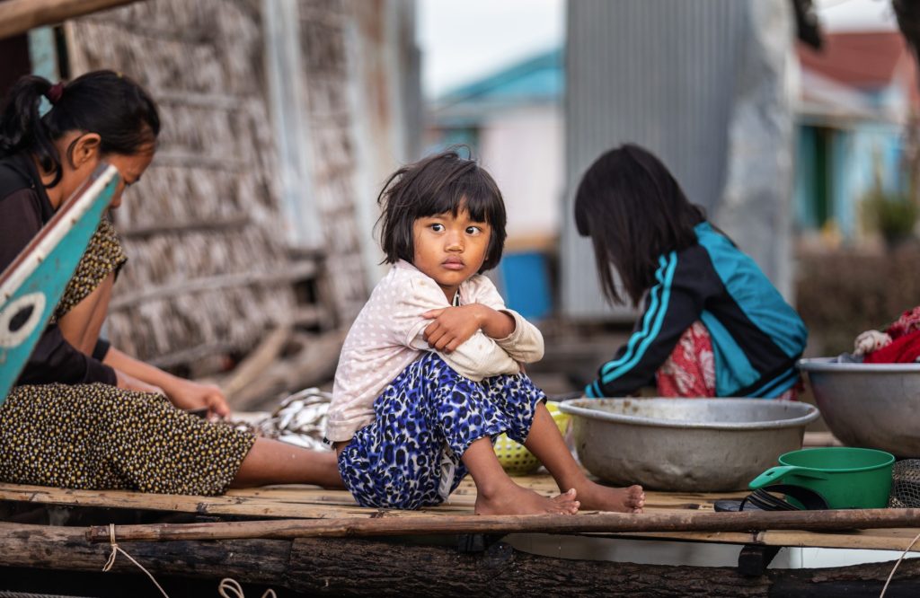 a poor child in the Tonle Sap Lake Cambodia